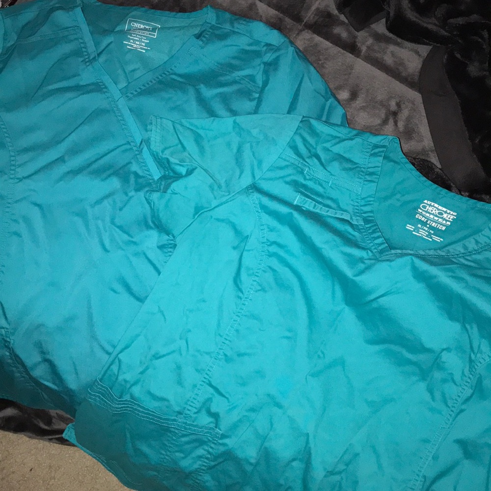 Two scrub tops
